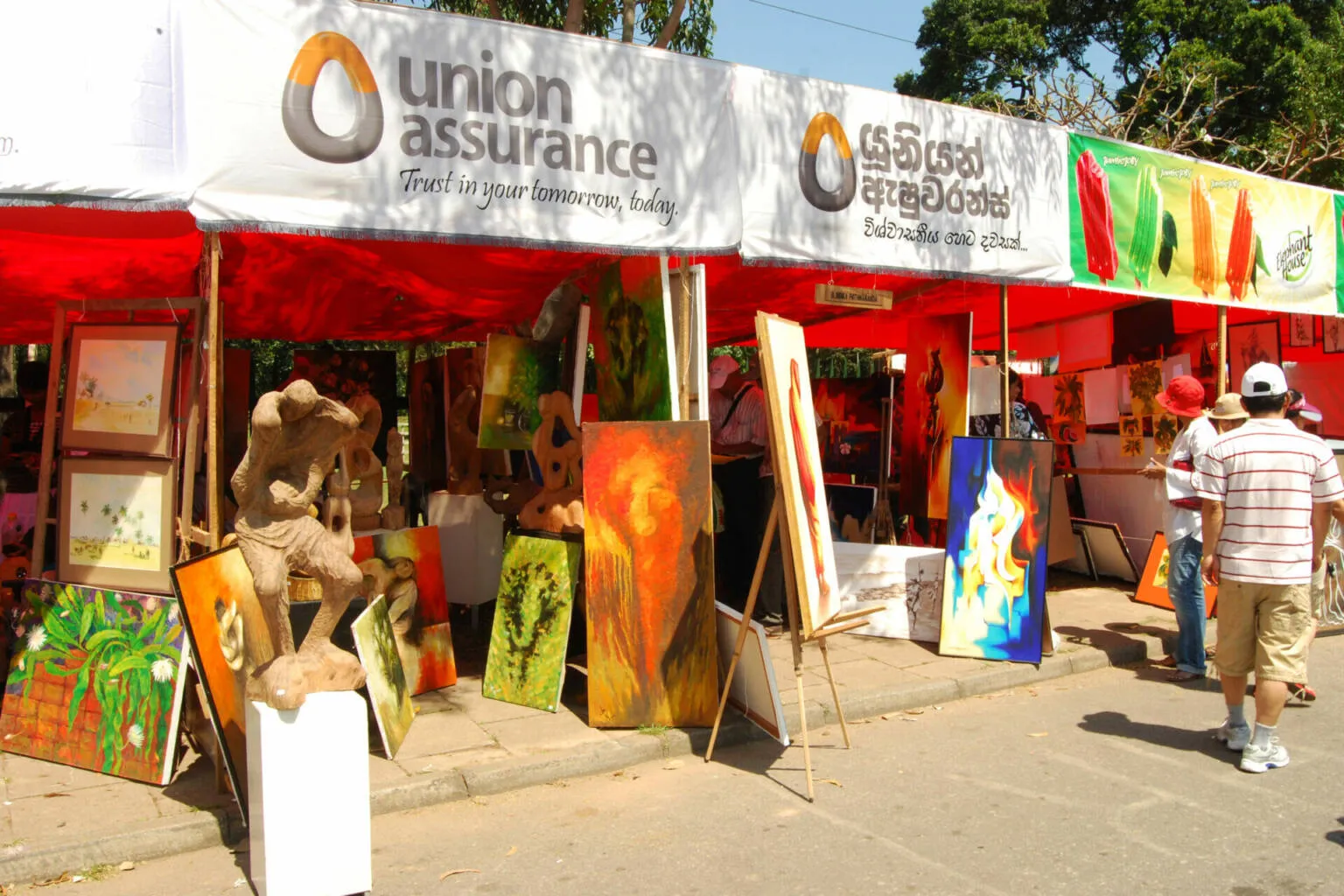 A spacious white tent showcasing the Union Assurance company, embodying protection and reliability in its design.