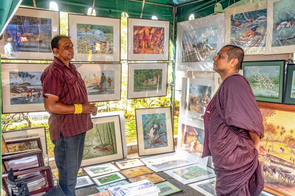 A woman in a headscarf, embodying grace and cultural heritage, captured in a peaceful environment and sell her paintings.